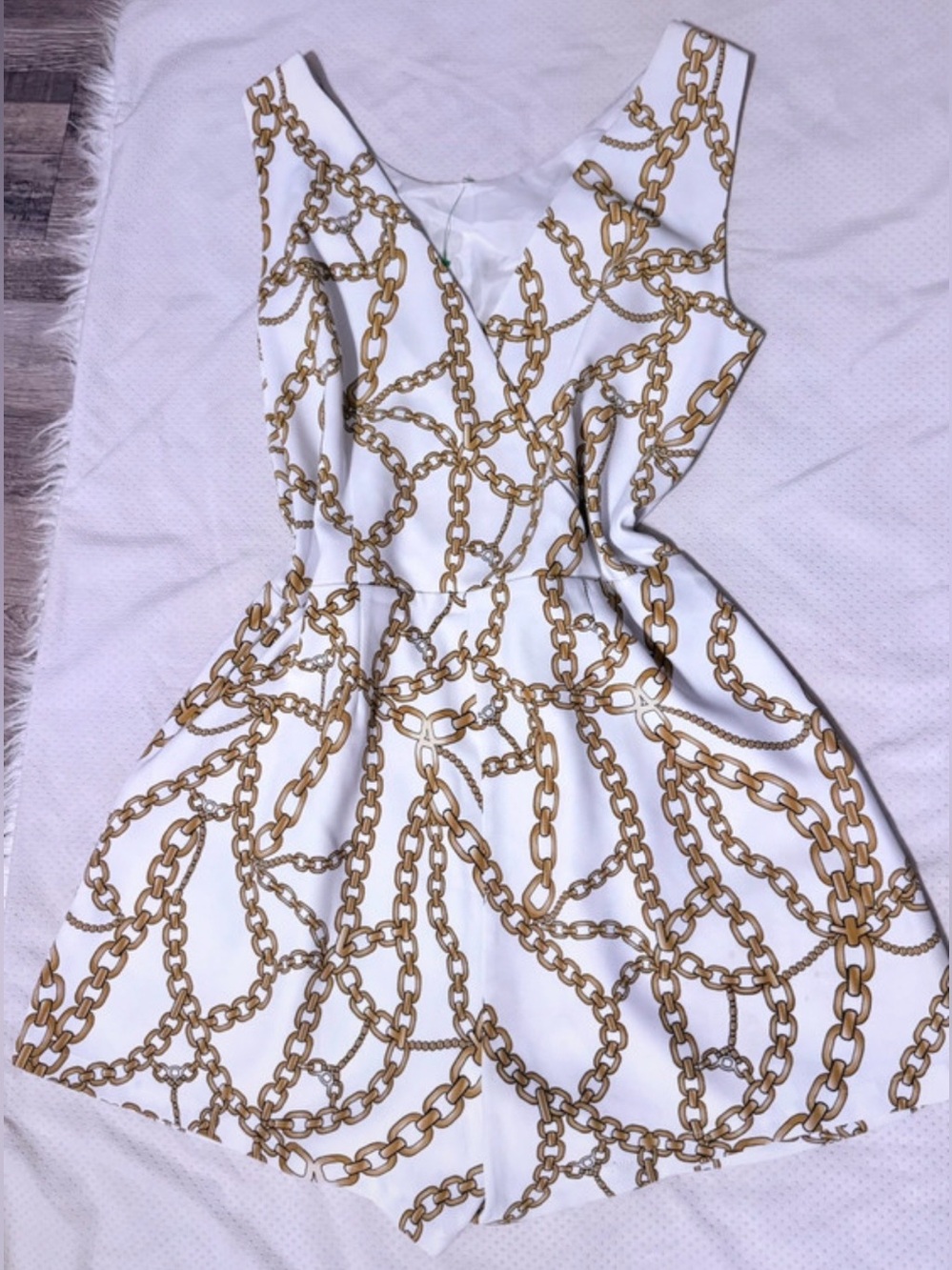 Jennifer Lopez White Mini Dress with Gold Chain Motif